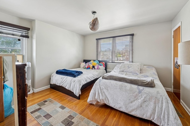 151AKA149 Stone Ave, Yonkers, NY 10701 - bedroom with multiple windows and wood finished floors
