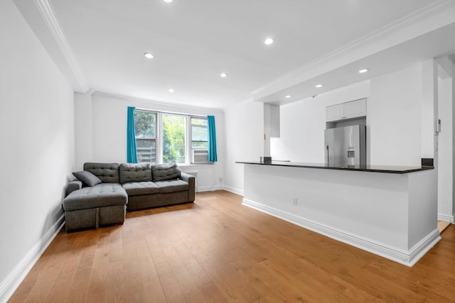3750 Hudson Manor Ter Unit 1Dw, Bronx, NY 10463 - living room featuring crown molding, light wood-style flooring, baseboards, and recessed lighting