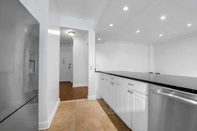 3750 Hudson Manor Ter Unit 1Dw, Bronx, NY 10463 - kitchen featuring stainless steel appliances, white cabinetry, dark countertops, recessed lighting, and ornamental molding