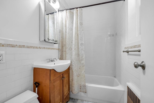 3750 Hudson Manor Ter Unit 1Dw, Bronx, NY 10463 - bathroom with tile walls, vanity, radiator, toilet, and shower / tub combo with curtain