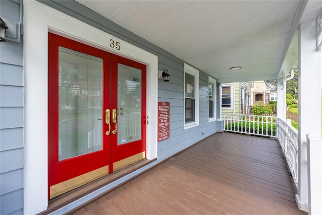 35 N St, Newburgh, NY 12550 - wooden porch featuring french doors