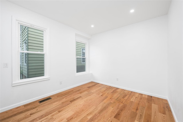 35 N St, Newburgh, NY 12550 - empty room with light wood-style floors, baseboards, and recessed lighting