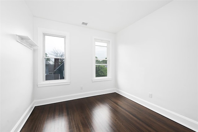 35 N St, Newburgh, NY 12550 - spare room with baseboards and dark wood finished floors