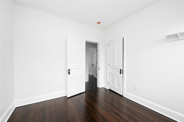 35 N St, Newburgh, NY 12550 - empty room featuring dark wood-type flooring and baseboards