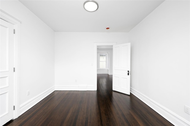 35 N St, Newburgh, NY 12550 - empty room with dark wood-type flooring and baseboards