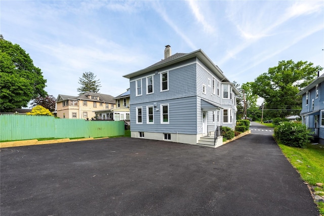 35 N St, Newburgh, NY 12550 - view of front of home with a chimney