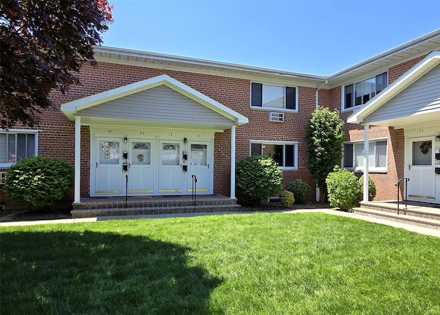 600 Fulton St Unit I-1, Farmingdale, NY 11735 - multi unit property featuring brick siding and a front lawn