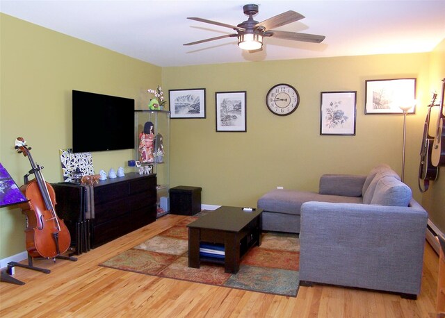 600 Fulton St Unit I-1, Farmingdale, NY 11735 - living area featuring ceiling fan and wood finished floors