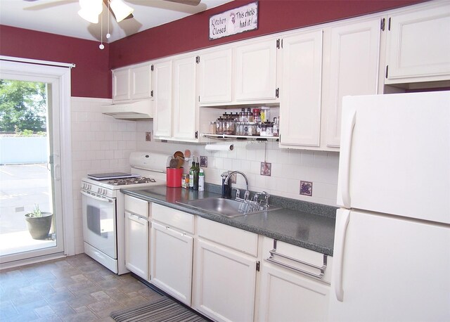 600 Fulton St Unit I-1, Farmingdale, NY 11735 - kitchen with white appliances, a sink, a ceiling fan, dark countertops, and white cabinetry
