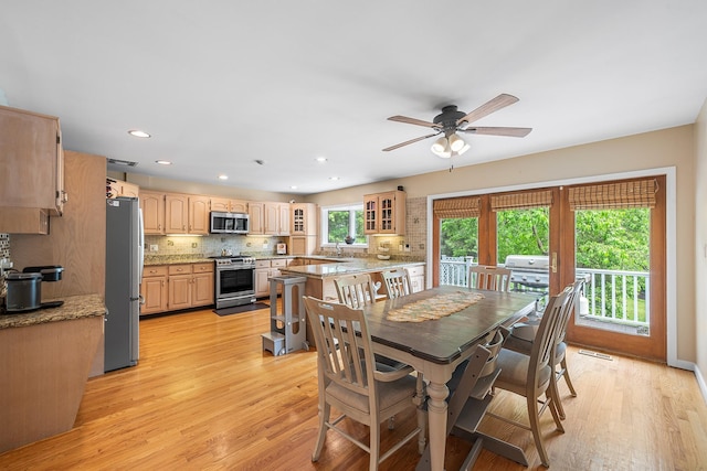 83 Mcdonald Rd, Ossining, NY 10562 - dining room featuring light wood-style flooring, ceiling fan, and recessed lighting