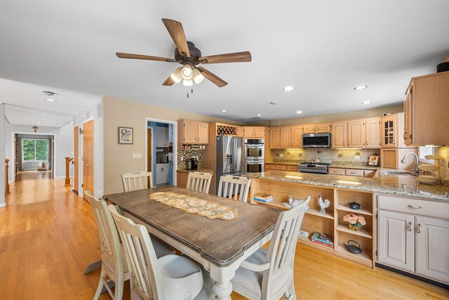 83 Mcdonald Rd, Ossining, NY 10562 - dining room with a ceiling fan, light wood-style floors, and recessed lighting