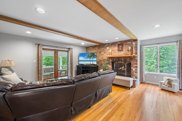 83 Mcdonald Rd, Ossining, NY 10562 - living room featuring beam ceiling, light wood-type flooring, a fireplace, and recessed lighting