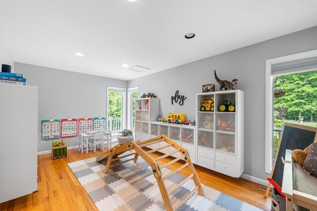 83 Mcdonald Rd, Ossining, NY 10562 - rec room featuring plenty of natural light, wood finished floors, and recessed lighting