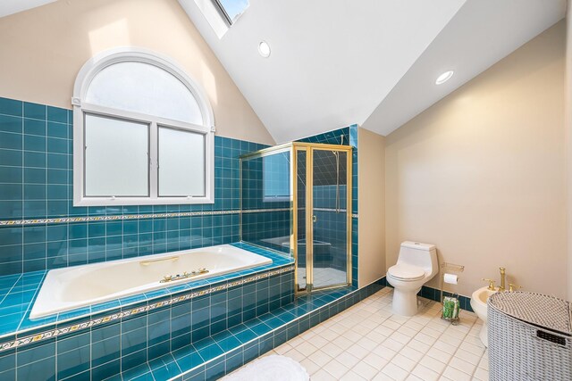 83 Mcdonald Rd, Ossining, NY 10562 - bathroom featuring tile patterned floors, a bidet, a bath, a shower stall, and lofted ceiling