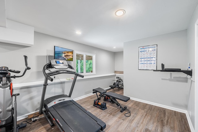 83 Mcdonald Rd, Ossining, NY 10562 - workout area featuring wood finished floors and recessed lighting