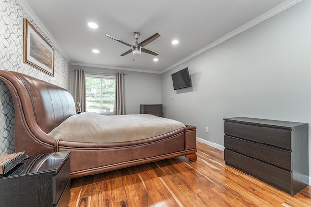 62 Alhambra Dr, Oceanside, NY 11572 - bedroom featuring light wood-style flooring, crown molding, baseboards, recessed lighting, and a ceiling fan