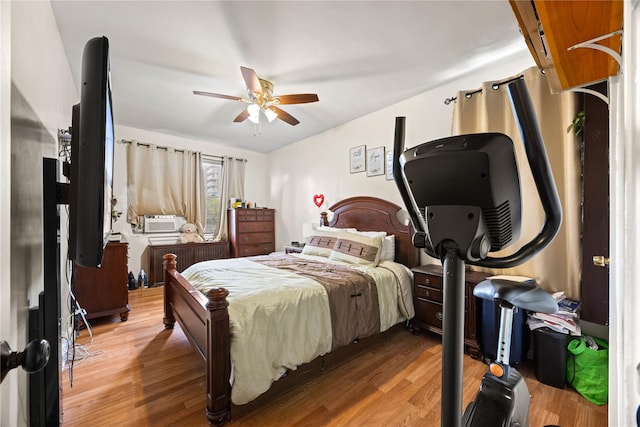 1363 Noble Ave, Bronx, NY 10472 - bedroom featuring light wood-style floors, cooling unit, and a ceiling fan