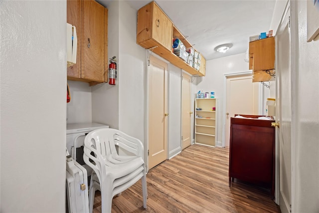 1363 Noble Ave, Bronx, NY 10472 - laundry area with light wood-style floors