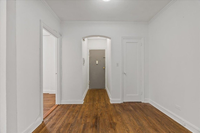 98-120 Queens Blvd Unit 5G, Rego Park, NY 11374 - unfurnished room with arched walkways, dark wood-type flooring, crown molding, and baseboards