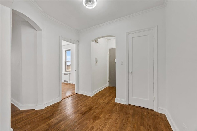 98-120 Queens Blvd Unit 5G, Rego Park, NY 11374 - hall with arched walkways, wood finished floors, crown molding, and baseboards