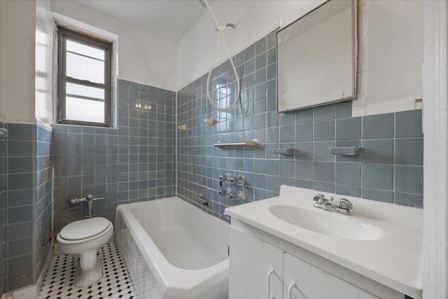 98-120 Queens Blvd Unit 5G, Rego Park, NY 11374 - full bathroom with tile walls, toilet, a bath, vanity, and tile patterned floors