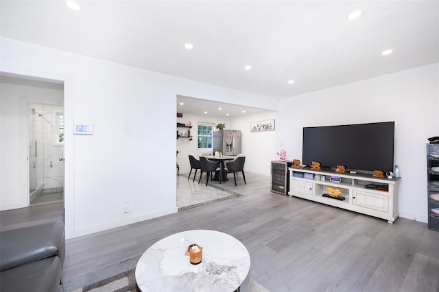 223-36 65th Ave Unit 2A, Bayside, NY 11364 - living room featuring recessed lighting, wood finished floors, and baseboards