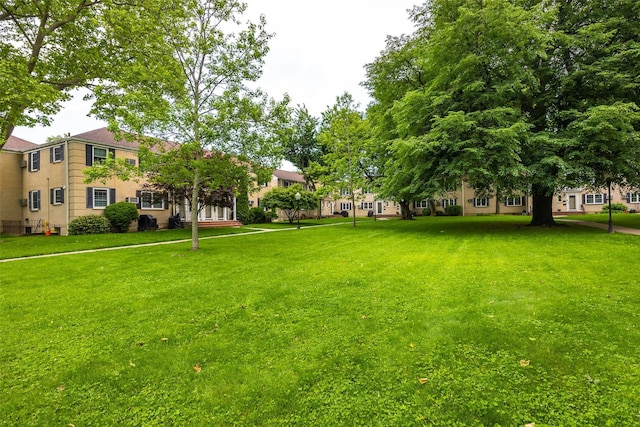 223-36 65th Ave Unit 2A, Bayside, NY 11364 - view of community with a yard
