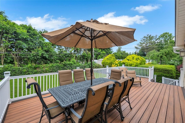18 Commander Vic Ln, Nesconset, NY 11767 - wooden terrace featuring outdoor dining area, a yard, and view of wooded area