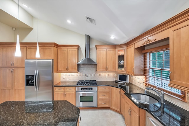 18 Commander Vic Ln, Nesconset, NY 11767 - kitchen featuring appliances with stainless steel finishes, wall chimney exhaust hood, a sink, vaulted ceiling, and decorative backsplash
