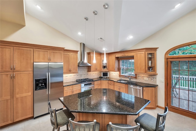 18 Commander Vic Ln, Nesconset, NY 11767 - kitchen with stainless steel appliances, lofted ceiling, wall chimney exhaust hood, a breakfast bar, and backsplash