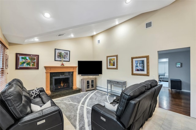 18 Commander Vic Ln, Nesconset, NY 11767 - living area with lofted ceiling, recessed lighting, a premium fireplace, light wood finished floors, and baseboards
