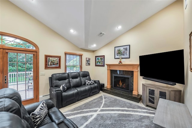 18 Commander Vic Ln, Nesconset, NY 11767 - living area with lofted ceiling, a baseboard radiator, recessed lighting, a fireplace, and baseboards