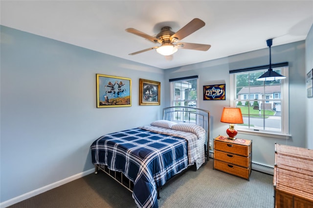 18 Commander Vic Ln, Nesconset, NY 11767 - bedroom featuring carpet, a baseboard radiator, baseboards, and ceiling fan