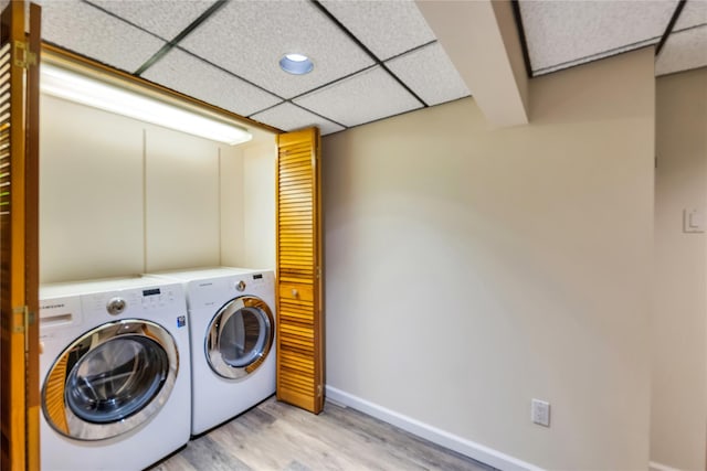 18 Commander Vic Ln, Nesconset, NY 11767 - laundry room featuring light wood finished floors, baseboards, washing machine and clothes dryer, and recessed lighting