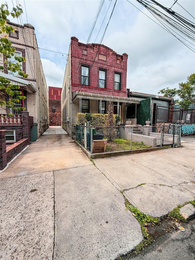 412 Newport St, Brooklyn, NY 11207 - view of front of home featuring a fenced front yard, driveway, and covered porch