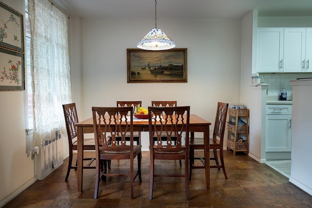 315 W 232nd St Unit 3C, Bronx, NY 10463 - dining space with healthy amount of natural light, baseboards, and radiator heating unit