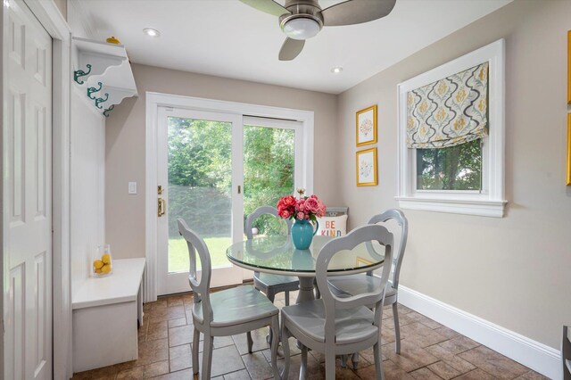 344 N Forest Ave, Rockville Centre, NY 11570 - dining area with stone tile floors, ceiling fan, baseboards, and recessed lighting
