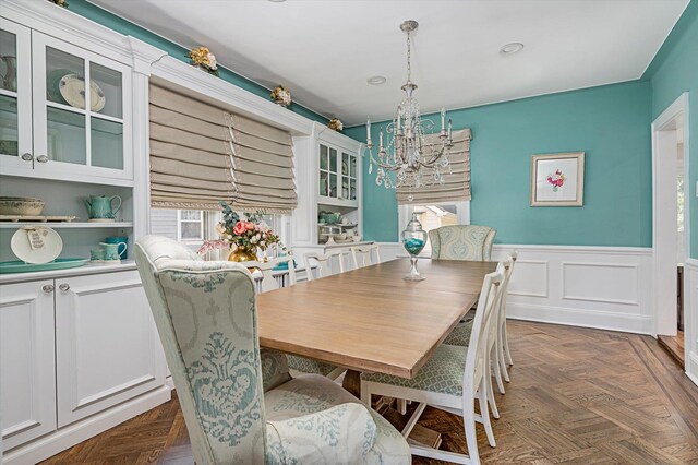 344 N Forest Ave, Rockville Centre, NY 11570 - dining space featuring a chandelier and wainscoting