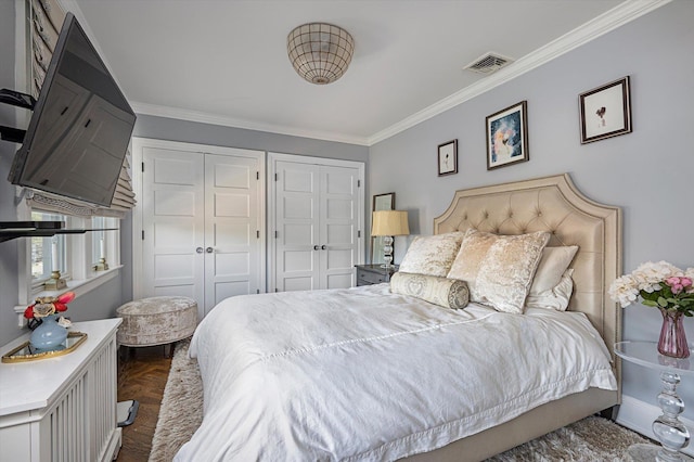 344 N Forest Ave, Rockville Centre, NY 11570 - bedroom with crown molding and two closets