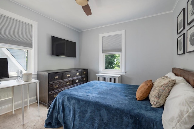 344 N Forest Ave, Rockville Centre, NY 11570 - carpeted bedroom featuring radiator, crown molding, and a ceiling fan
