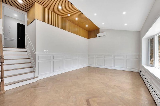 23 Vinton St, Long Beach, NY 11561 - spare room with baseboard heating, a wall mounted AC, a decorative wall, wainscoting, and recessed lighting