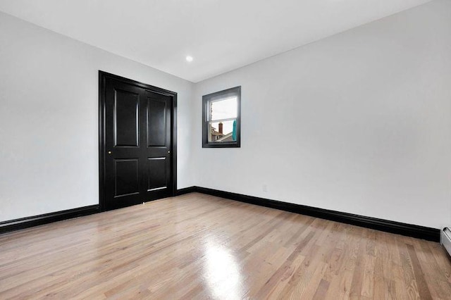 23 Vinton St, Long Beach, NY 11561 - empty room featuring light wood-style flooring, baseboards, and recessed lighting