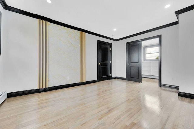 23 Vinton St, Long Beach, NY 11561 - empty room featuring crown molding, wood finished floors, baseboards, and recessed lighting