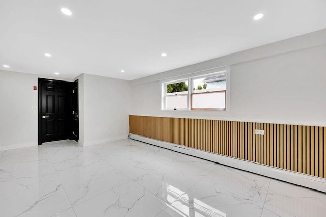 23 Vinton St, Long Beach, NY 11561 - unfurnished room featuring a baseboard radiator, marble finish flooring, baseboards, and recessed lighting
