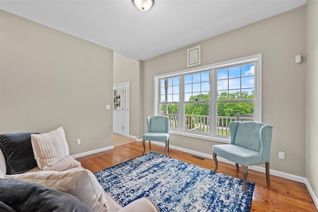 22 Restorative Ln, Middletown, NY 10940 - living area with baseboards and wood finished floors