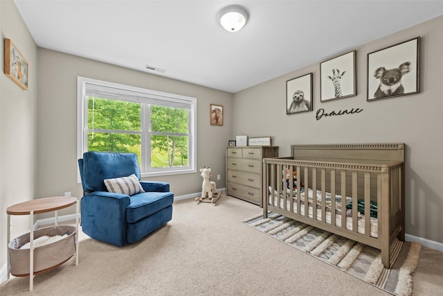 22 Restorative Ln, Middletown, NY 10940 - carpeted bedroom featuring baseboards and a crib