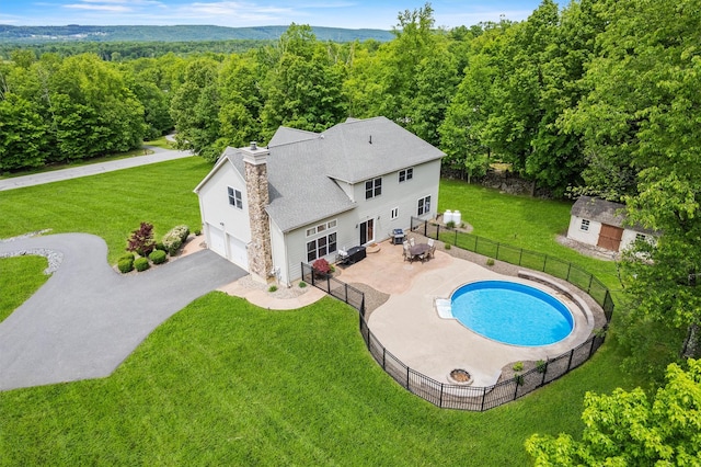 22 Restorative Ln, Middletown, NY 10940 - view of pool with a view of trees, an outbuilding, and a patio