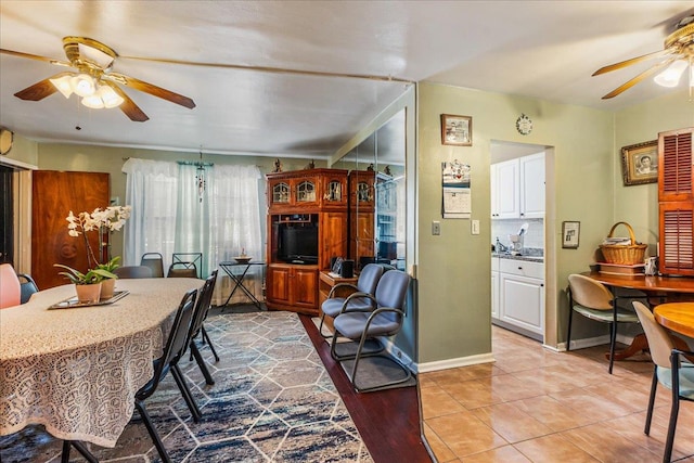196-66 67th Ave Unit 1Fl, Fresh Meadows, NY 11365 - dining space with ceiling fan and baseboards