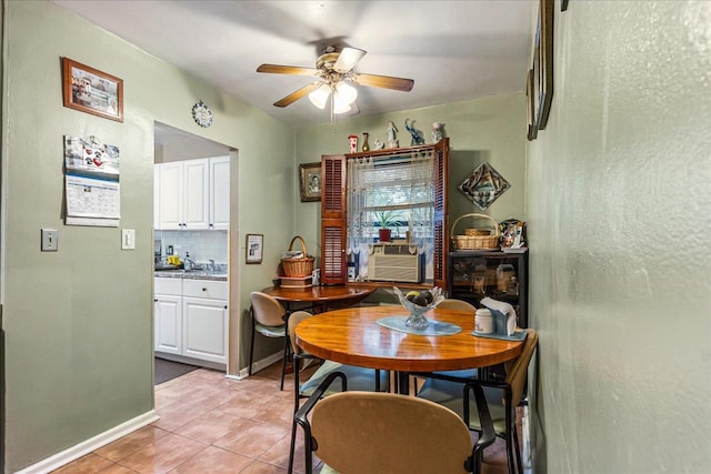 196-66 67th Ave Unit 1Fl, Fresh Meadows, NY 11365 - dining room with a ceiling fan, light tile patterned flooring, and baseboards
