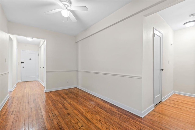 280 Collins Ave Unit 6J, Mount Vernon, NY 10552 - empty room with wood-type flooring, a ceiling fan, and baseboards